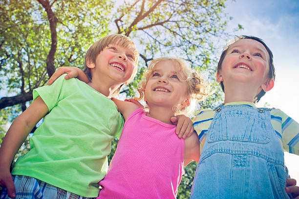 istock Three happy children in summer 509489004