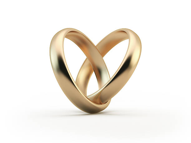 anéis de casamento ouro, formando uma forma de coração - wedding ring love engagement imagens e fotografias de stock