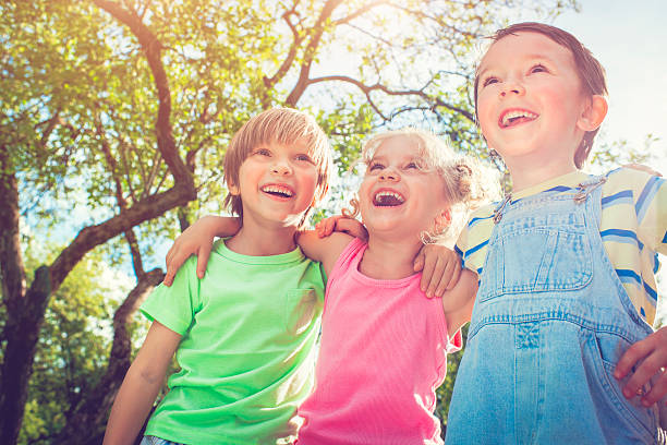 istock Three happy children in summer 509490058