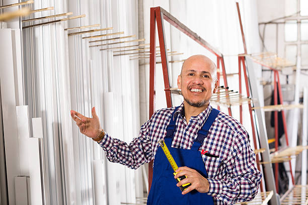 istock worker working in PVC shop and smiling 509490440