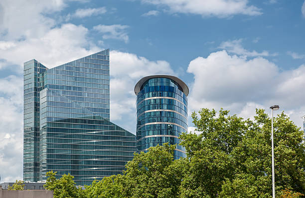 istock Modern building near park with green trees 509493079