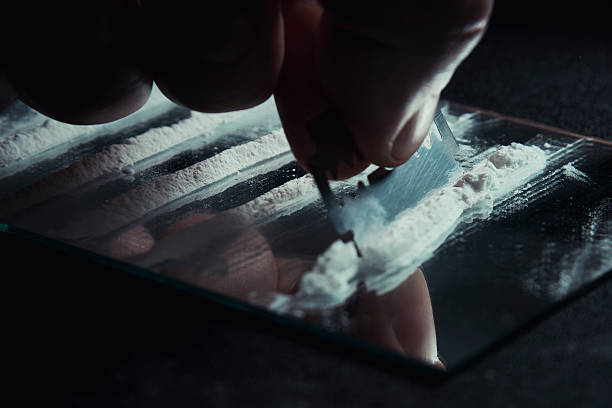 Cocaine Close up photo of white powder. Stop drugs. razor blade photos stock pictures, royalty-free photos & images