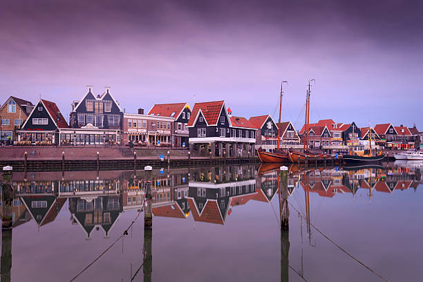 traditional houses along the harbour of Volendam stock photo