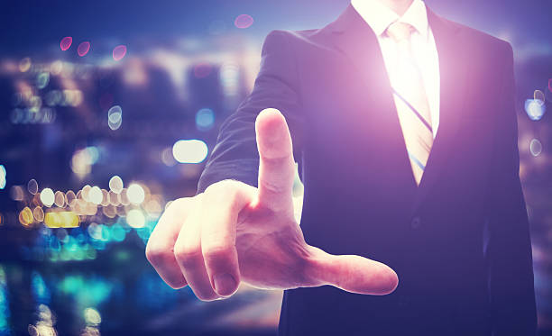 istock Businessman pointing to something on a blurred background 509499702