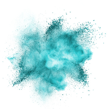 Blue powder explosion isolated on white background