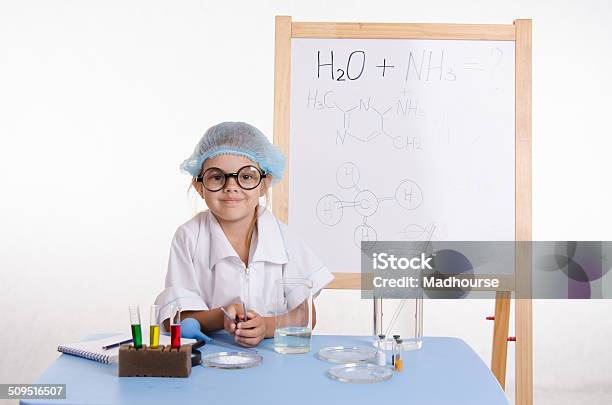 Scientist Chemist At Table In The Laboratory Stock Photo - Download Image Now - Baby - Human Age, Backgrounds, Chemical