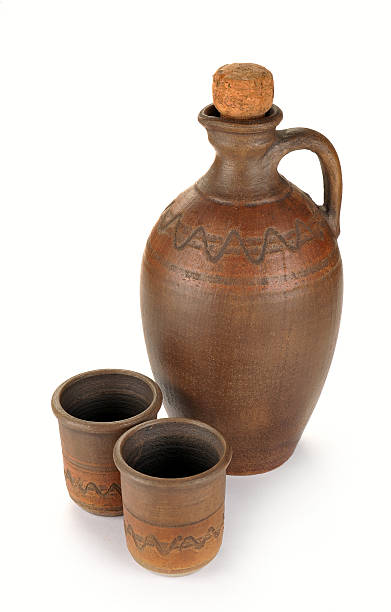 istock pitcher and two cups of clay 509516569