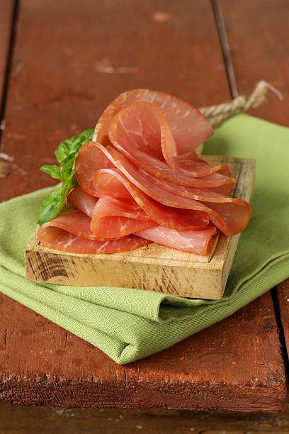 istock smoked pork ham on cutting wooden board 509516921