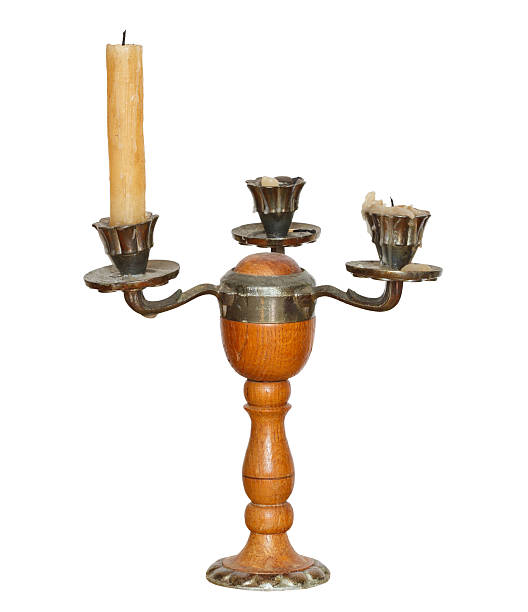 istock triple candlesholder with one candle isolated 509517453