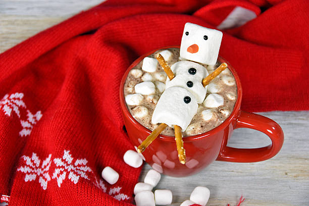 istock snowman in hot chocolate drink 509533186