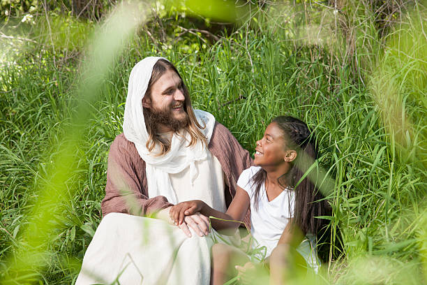 istock Jesus Christ Laughing with Girl 509533290