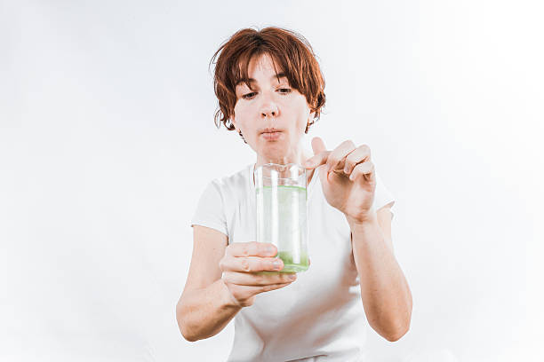 istock Person with water glass 509534224