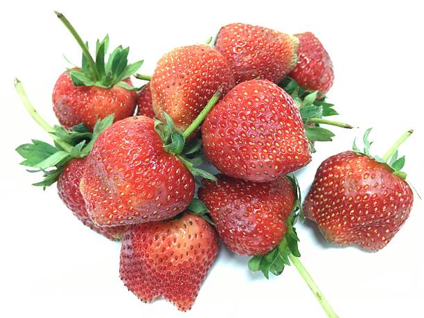 istock Strawberries with leaves. Isolated on a white background. 509534354