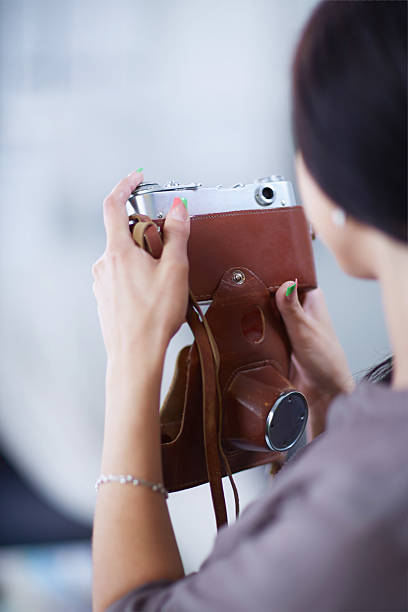 istock Woman is a proffessional photographer with camera 509535307