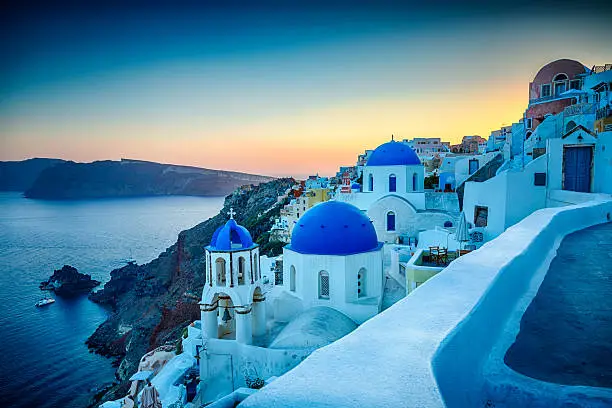 Traditional Greek village Oia (Ia) on Santorini island in dusk. Click for more images: 