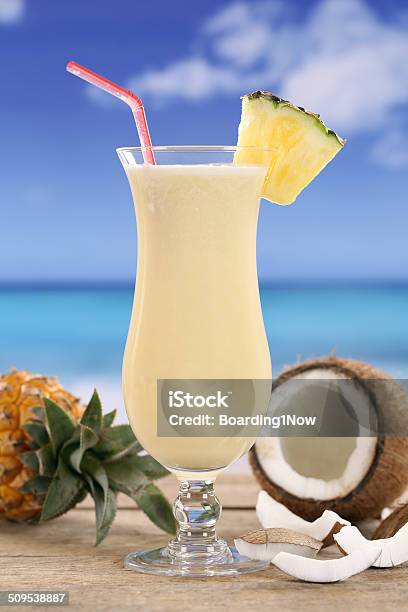 Pina Colada Cocktail With Fruits On The Beach Stock Photo - Download Image Now - Beach, Pina Colada, Alcohol - Drink