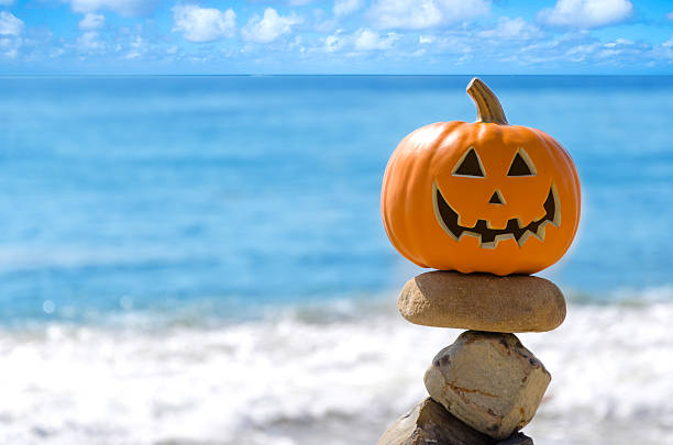 istock Halloween pumpkin on the beach 509539901