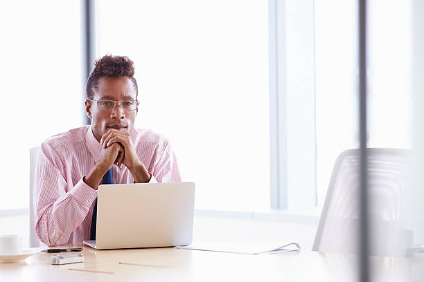 istock Businessman Working On Laptop At Boardroom Table 509540057