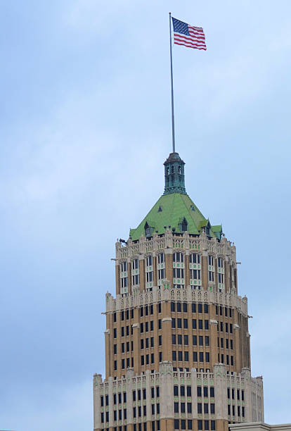 istock Flag on top of skyscraper 509540072