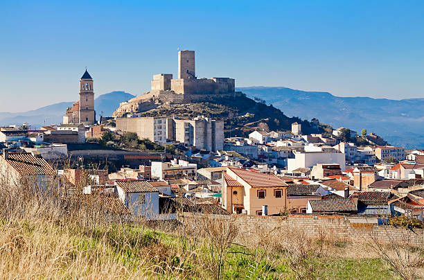 Alcaudete with castle and old church. Province of Jaen, Spain stock photo