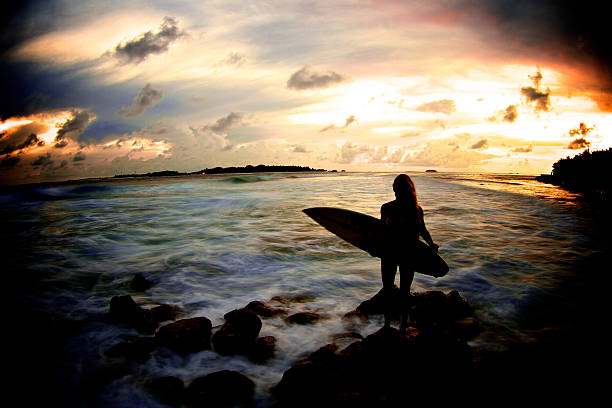 istock Dark sihlouette speedblur surfer girl 509543280