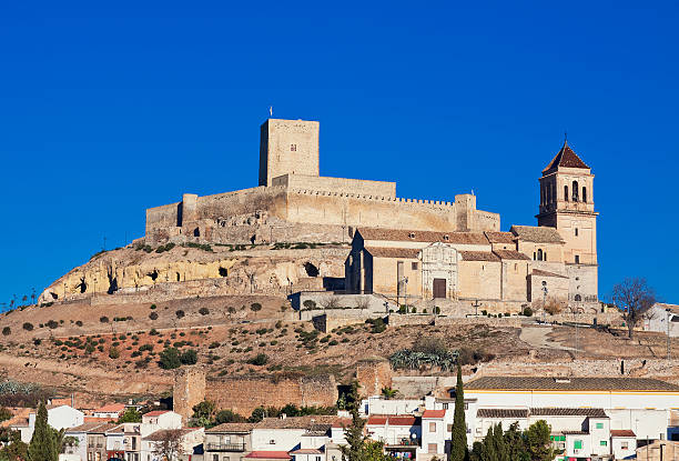 Alcaudete with castle and old church. Province of Jaen, Spain stock photo