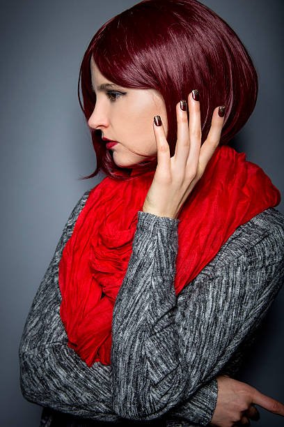 istock Redhead with Red Stick On Nail Art or Nail Polish 509545708