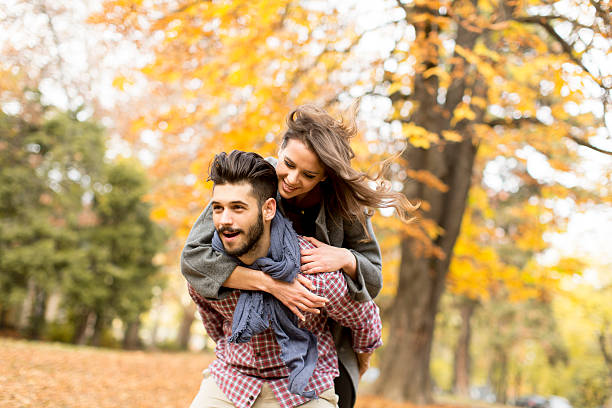 istock Young couple in the autumn forest 509546390