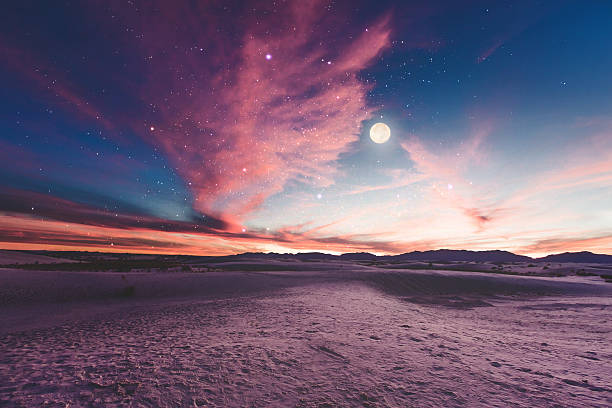 Moon gazing Sunset in New Mexico surreal stock pictures, royalty-free photos & images
