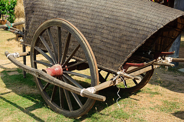 Covered wagon - rustic wooden Conestoga style - used on Oregon Trail by 19th century Wild West settlers.  Also used by the U.S. Cavalry and ranchers during livestock drives.  Pioneers traveling across the vast Mid-West dubbed them prairie schooners.