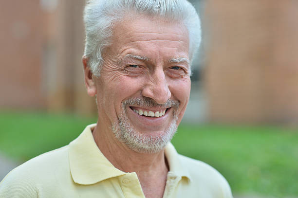 istock senior man  in summer park 509552956