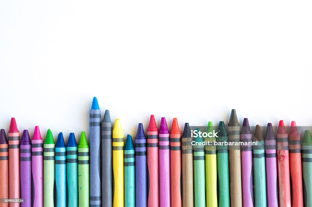 Crayons lined up isolated on white background Crayons and pastels lined up isolated on white background for banner Crayon Stock Photo