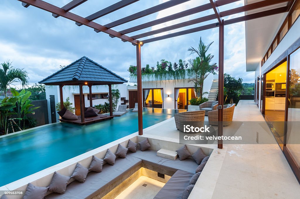 Tropical modern villa exterior A tropical modern villa exterior view with built in sofa Luxury Stock Photo
