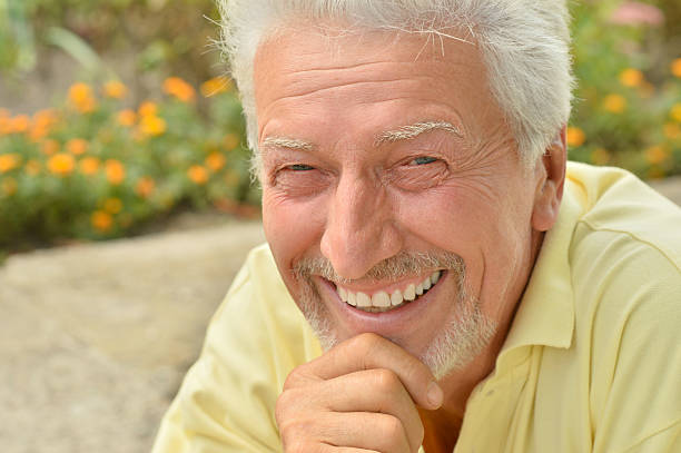 istock senior man  in summer park 509556442
