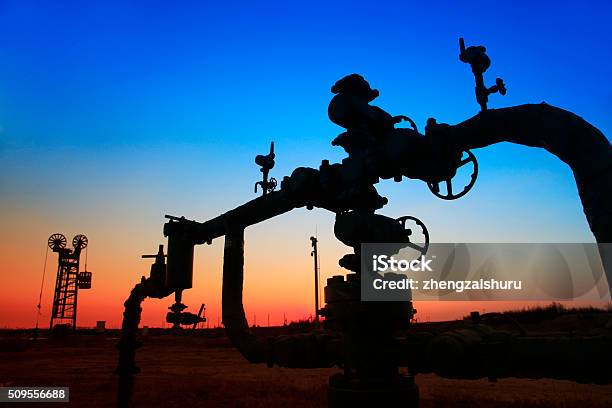 In The Evening Of Oilfield Pipeline Silhouette Stock Photo - Download Image Now - Pipeline, Natural Gas, Crude Oil