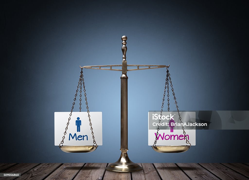 Gender equality Equality between man and woman concept with beam scales and sign Equality Stock Photo