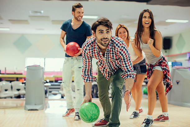 istock Cheerful Friends Bowling Together 509558952