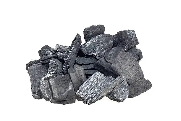 Pile of coal  on white background.