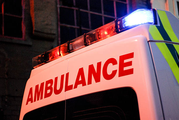 istock Ambulance in the street at night 509559390