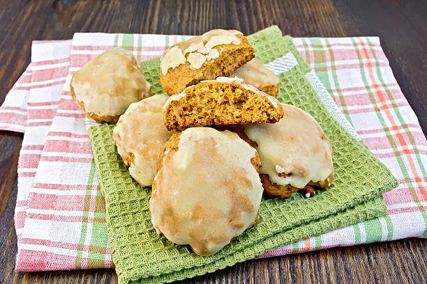 istock Cookies pumpkin on kitchen towel and board 509559754