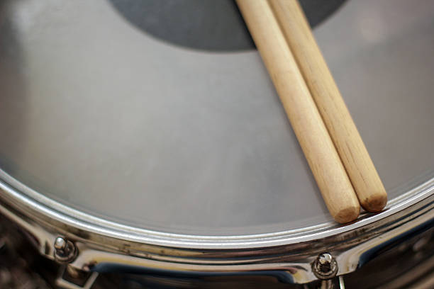 istock Drum sticks laying on snare drum. 509560678