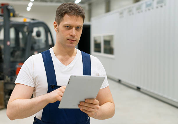 istock Handsome supervisor with tablet pc at the warehouse. 509560734