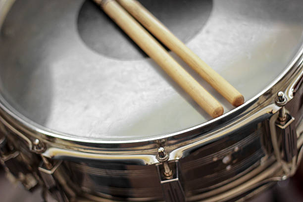 istock Drum sticks laying on snare drum. 509560792