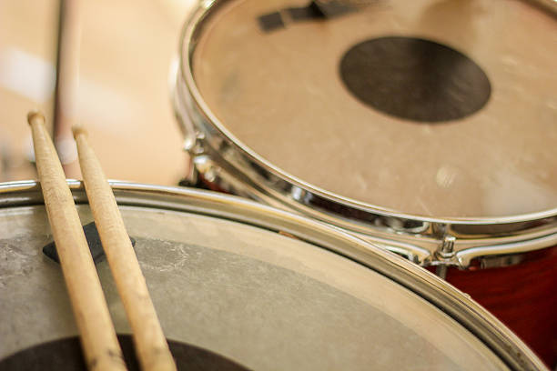 istock Drum sticks laying on snare drum. 509560938