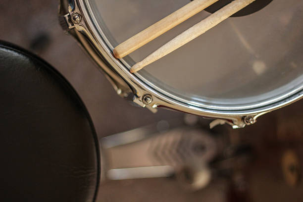 istock Drum sticks laying on snare drum. 509561066