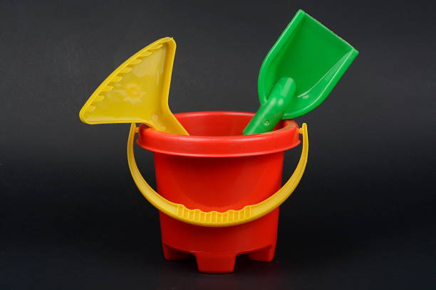 istock Cube beach rake and shovel. Beach Toys. 509561296