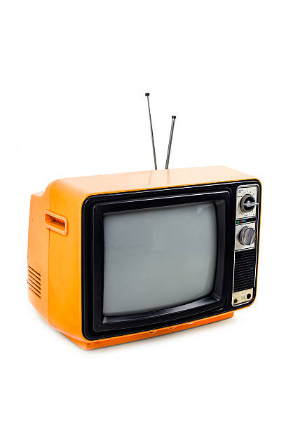 istock Orange vintage style old television isolated on white 509562569