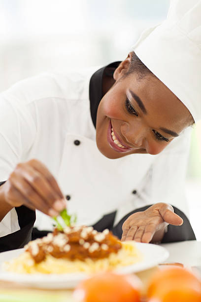 istock african american chef decorating pasta dish 509564963