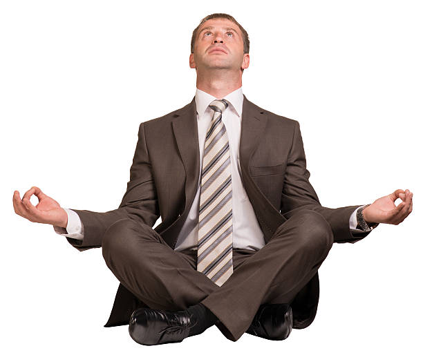 istock Businessman sitting in lotus position 509565575