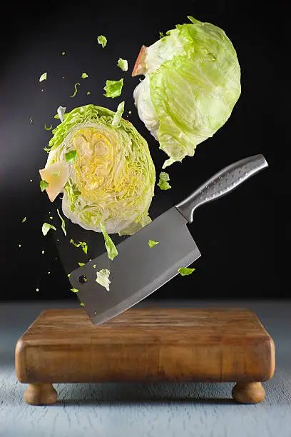 Head of iceberg lettuce, chopped in two.